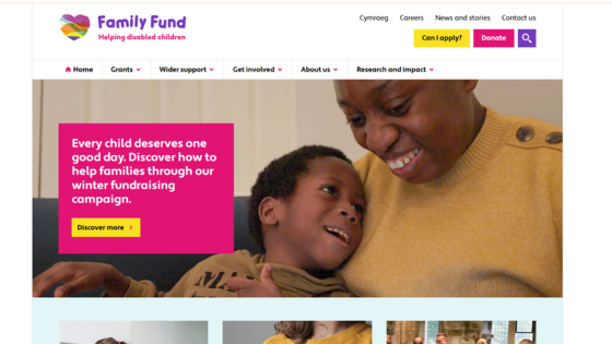 mother with deaf child both smiling